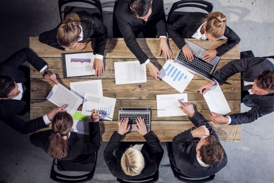Business people analyzing documents